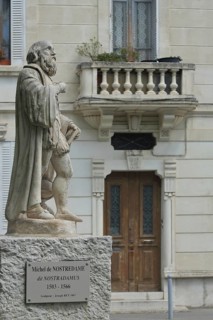 Monument to Michel de Nostradamus, stone sculpture with inscription, Salon-de-Provence,