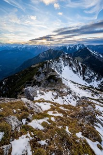 Mountain panorama, mountain landscape with sun star at sunset, at the summit of the Kramerspitz, in