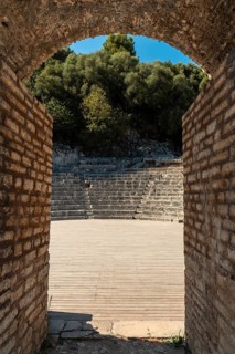 Entrance to the theater and amphitheater in the archaeological ruins of the Butrint or Butrinto