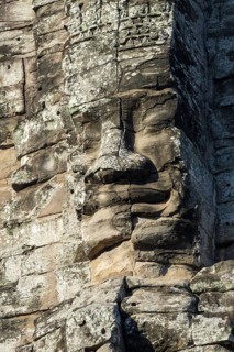 Giant stone-carved face of the Bodhisattva Lokeshvara, also known as Avalokiteshvara, Bayon Temple,