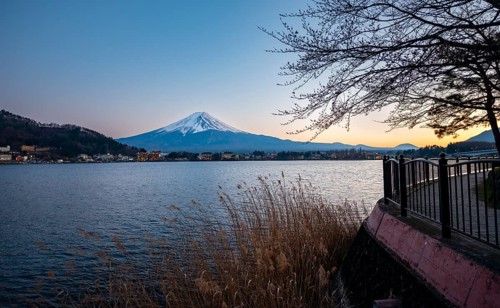Kawaguchi Lake waterfront, view of Mount Fuji volcano at sunset, Yamanashi Prefecture, Japan