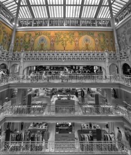 View of the shopping floors and restaurant of the exclusive La Samaritaine department store, black
