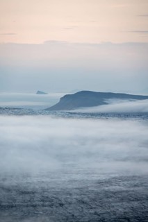 Fog over the glacier ice of Myrdalsjökull glacier, at sunset, Pakgil, Iceland