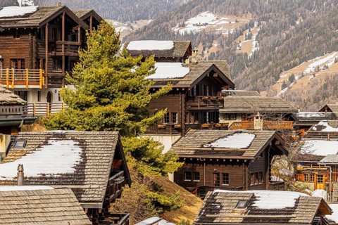 Snow-covered old farmhouses with balconies, Grimentz, Val d'Anniviers, Valais Alps, Canton of