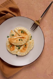 Pierogi, a traditional dish of Polish cuisine, dumplings, top view, close-up, no people