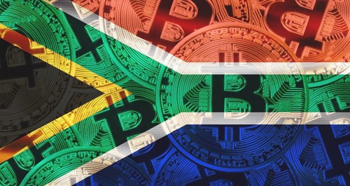Bitcoin coins on South Africa flag background. Golden bitcoin coins on South Africa flag background