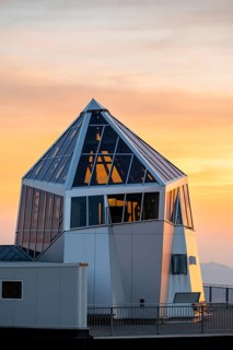 Mountain station of the Tyrolean Zugspitze railway at the summit of the Zugspitze, at sunset,