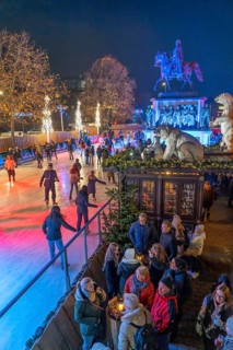 Christmas market with ice rink at Heumarkt, in the historic city centre of Cologne, North
