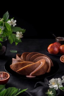 Dessert made from sanguine in a spiral shape on the table in a decorative way