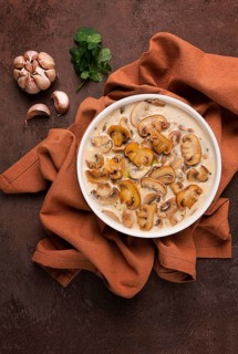 Champignons in creamy garlic sauce, with herbs and spices, gravy, sauce, no people