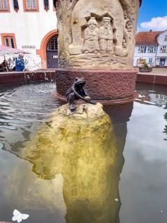 Figure of Frog King with golden ball in fairy tale fountain, Steinau an der Straße, Hesse, Germany