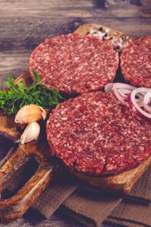 Raw cutlets, for burgers, minced meat, handmade, homemade, with spices, top view, no people