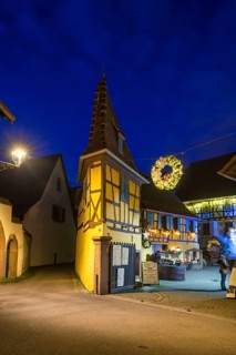 Houses illuminated and decorated for Christmas, Christmas market, blue hour, Eguisheim, Haut-Rhin