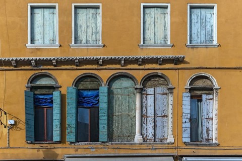Historic, unrenovated façade of a palazzo, Venice, Veneto, Italy