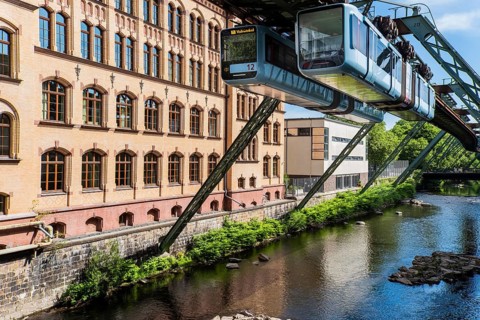 The Wuppertal suspension railway runs through a historic district near the Robert-Daum-Platz stop