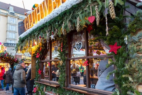Lovingly decorated market stand with window at the Striezelmarkt Christmas market, Dresden, Saxony,