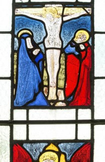 Fifteenth century stained glass window of crucifixion in church of Saint Matthew, Rushall,