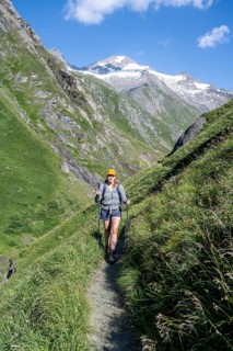 View of Rötspitze, hiker in Umbaltal, Hohe Tauern National Park, East Tyrol, Tyrol, Austria