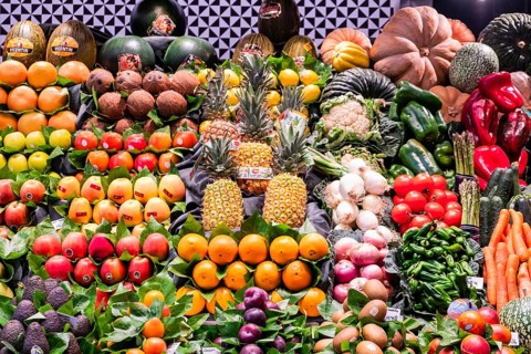 Fresh fruit and vegetables at a market stall at the Mercado de la Boqueria, the famous market on