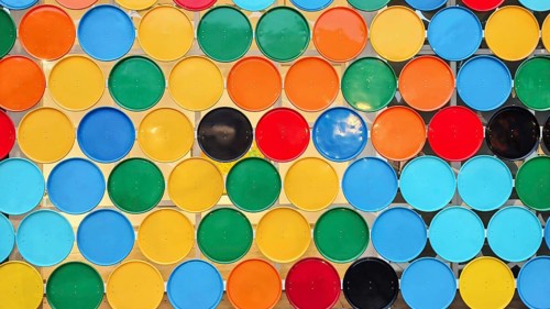 Facade of the Mindelo Cultural Center, close-up of a pattern of colorful circles in various color