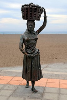 Sculpture of woman carrying full basketon her head, Gran Tarajal, Fuerteventura, Canary Islands,