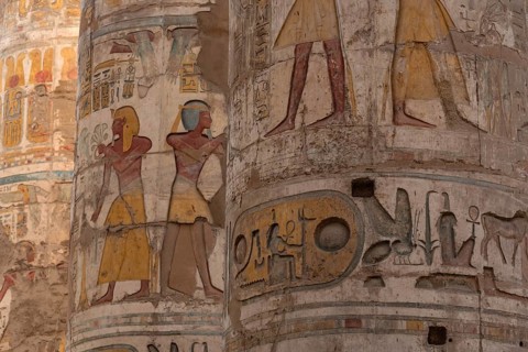 Ancient Egyptian Pharaonic Hieroglyphic relief details on columns of the Great Hypostyle Hall of