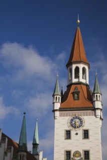 Bell and clock tower of the Altes Rathaus Old City Hall with traditional terracotta ceramic tiled