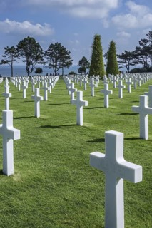 White crosses for fallen US soldiers at the Normandy American Cemetery and Memorial, Omaha Beach,