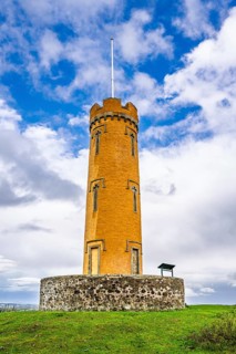 Binns Tower over Scotish farms and Forth Estuary, House of the Binns, Linlithgow, Scotland, UK