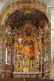 Main altar with painting John of Patmos, by the baroque painter Johann Baptist Zimmermann,
