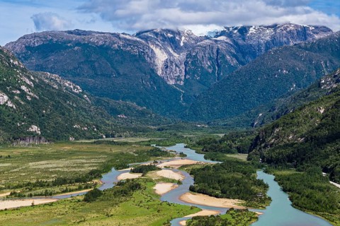 Gravel road along river Rio Norte, Valle Exploradores, aerial view, near Puerto Tranquilo,