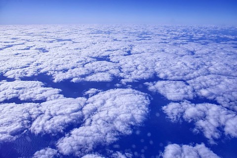 Approach to Arrecife with aerial views of a sea of clouds under a blue sky, Lanzarote
