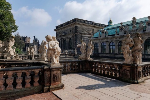 Stunning view of intricate sculptures at Zwinger Palace in Dresden, Germany. The Baroque