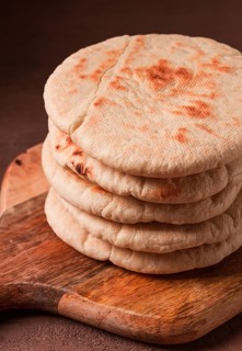 Pita bread, stack, on the table, no people