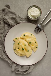 Pierogi, a traditional dish of Polish cuisine, dumplings, top view, close-up, no people