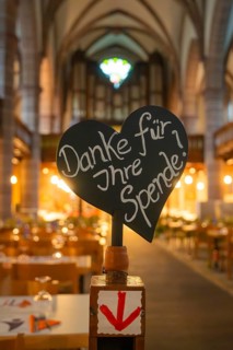 Handwritten heart sign in a church asking for donations, Vesperkirche Calw, Black Forest, Germany