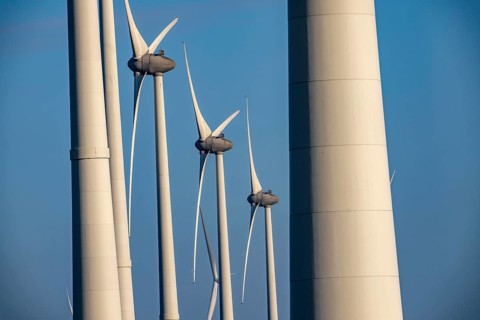 Wind farm in the north of the Netherlands, near Eemshaven, energy center, in addition to wind