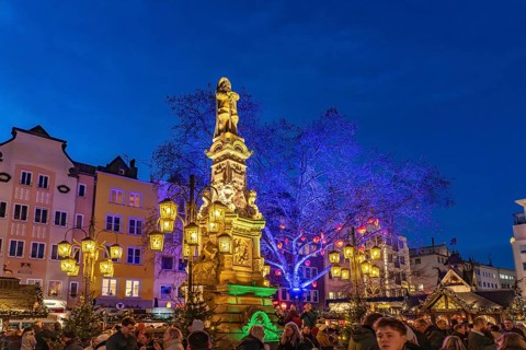 Christmas market Heinzel's winter fairy tale on Jan von Werth-Brunnen at dusk, Alter Markt,