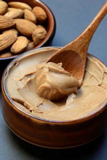 Almond cream in small bowls, spread