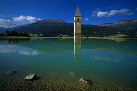 Lake Recshensee with church tower in South Tyrol, Lake Reschen, South Tyrol, Italy