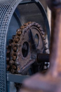 Close-up of a rusty cogwheel in an old industrial setting, Calw Tannery Museum, Black Forest,