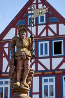 Market fountain man with market flag, knight, sandstone sculpture, fountain figure at the Kump,