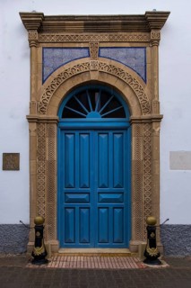 A blue door with a classic arch and detailed geometric patterns, Essaouira, Morocco