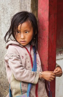 SAPA, VIETNAM, JUNE 10, 2011: Unidentified vietnamese girl in Ta Van village. Though Vietnam's