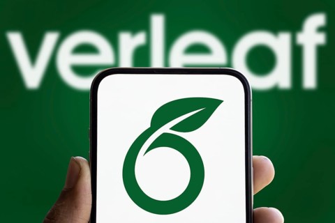 Overleaf logo is displayed on smartphone. Overleaf is a cloud-based LaTeX editor for scientific