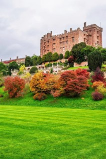 Autumn colors over Powis Castle and Garden, Welshpool, Powys, Wales, UK