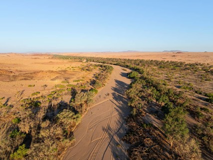 Aerial view, dry riverbed and desert landscape at Ugab River, Erongo, Damaraland, Namibia