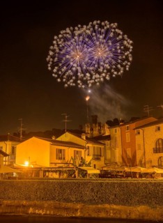 Fireworks from the Scaliger castle in the foreground Houses of, Borghetto, Valeggio sul Mincio,