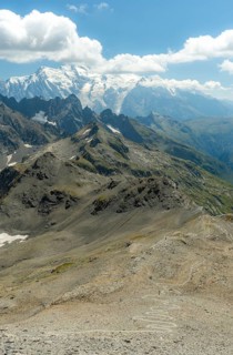 Beautiful summer scenery in the French Alps, featuring majestic peaks, rugged terrains, and