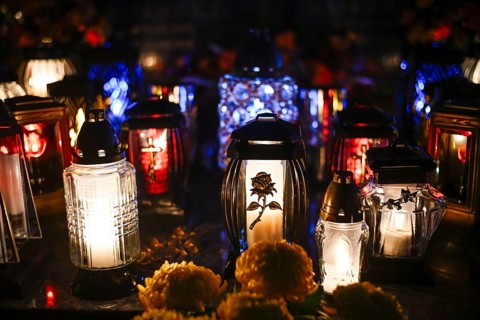 Lights on the grave on All Souls' Day